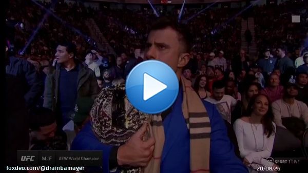 MJF at UFC 282 rocking the AEW World title and flipping the bird.  Never change, Max.