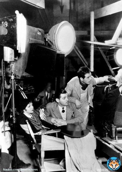 Frank Capra gets ready to shoot the next scene in 1934's 'It Happened One Night' while Claudette Colbert and Clark Gable wait in the wings. After she finished filming, Colbert said to her friends 'I just finished the worst picture in the world.&rdquodquo; She won Best Actress Oscar.