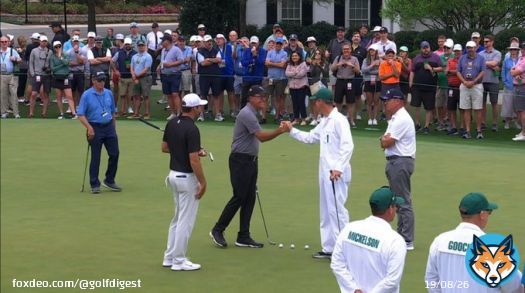 Scottie Scheffler, Ted Scott, and Phil Mickelson greet each other on the practice green.  #TheMasters