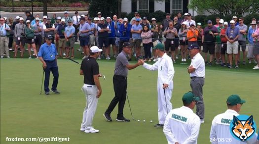 Scottie Scheffler, Ted Scott, and Phil Mickelson greet each other on the practice green.  #TheMasters