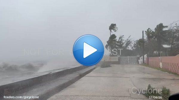 3 pm. On the waterfront in Belize City, near the edge of the eye. The sea is wanting to come over that wall. Chasing #Hurricane # LISA in #Belize