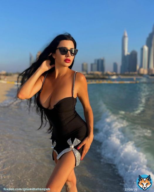 Dress to kill with angelic smile @bellaboutiques32 \ud83d\udda4...#blackdress #dresseswow #sunset #feminism #lamittafrangieh #summercollection #partydress #sealover #beautyicon #redlips\ud83d\udc8b