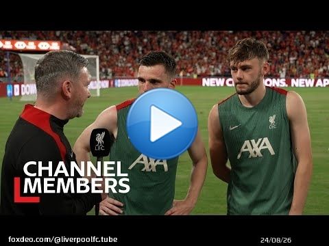 Andy Robertson & Conor Bradley catch up following open training session