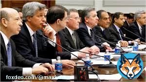 On the left, same guys, but with nice suits.   Will  ever incarcerate its financial terrorists?