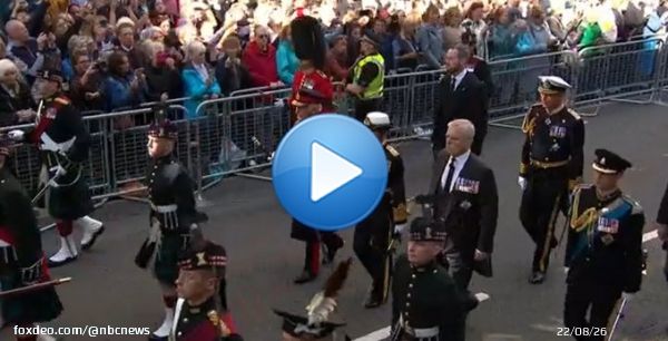 Queen Elizabeth's children, King Charles, Princess Anne, Prince Andrew and Prince Edward, stand in royal vigil beside her coffin in Edinburgh on Monday evening.
