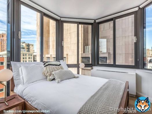 This 2 bedroom rental on the 20th floor of a Tribeca high-rise has a snow globe-like room with a queen bed and panoramic windows that are perfect for soaking in the sun. View NY-18840 our website (  #ManhattanRentals #NYApartments #RentingInNYC