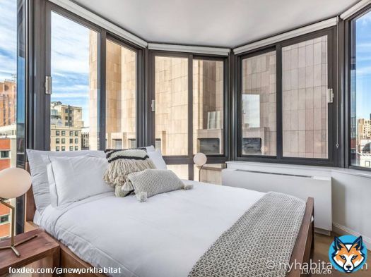This 2 bedroom rental on the 20th floor of a Tribeca high-rise has a snow globe-like room with a queen bed and panoramic windows that are perfect for soaking in the sun. View NY-18840 our website (  #ManhattanRentals #NYApartments #RentingInNYC