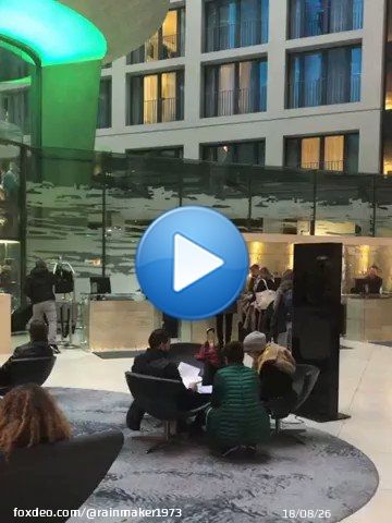 The AquaDom in Berlin, a 25 m tall cylindrical acrylic glass aquarium with built-in transparent elevator containining 1 million liters of water and over 1,500 fish of 50 species, has burst flooding the nearby streets.  [video: