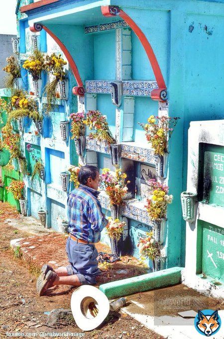 A man prays over a dead loved one&rsquo;s resting place in Solola, Guatemala, Central America. Gary Moore photo. Real World Photographs. #photojournalism #world #cemetery #guatemala #centralamerica #sweden #garymoorephotography #realworldphotographs #nikon #documentary