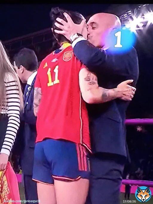 This guy kissing Jennifer Hermoso is apparently the head of Spain's soccer federation,   Now that she has come out to say that the kiss was uncomfortable, he should just resign Because they will take shovel dig six feet and put him under.