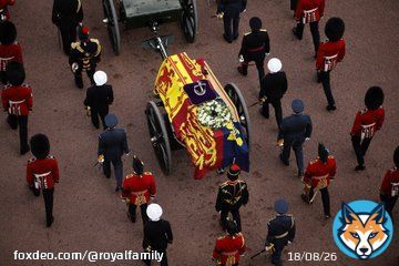 Draped in the Royal Standard, Her Majesty The Queen's coffin is taken in Procession to Westminster Hall.