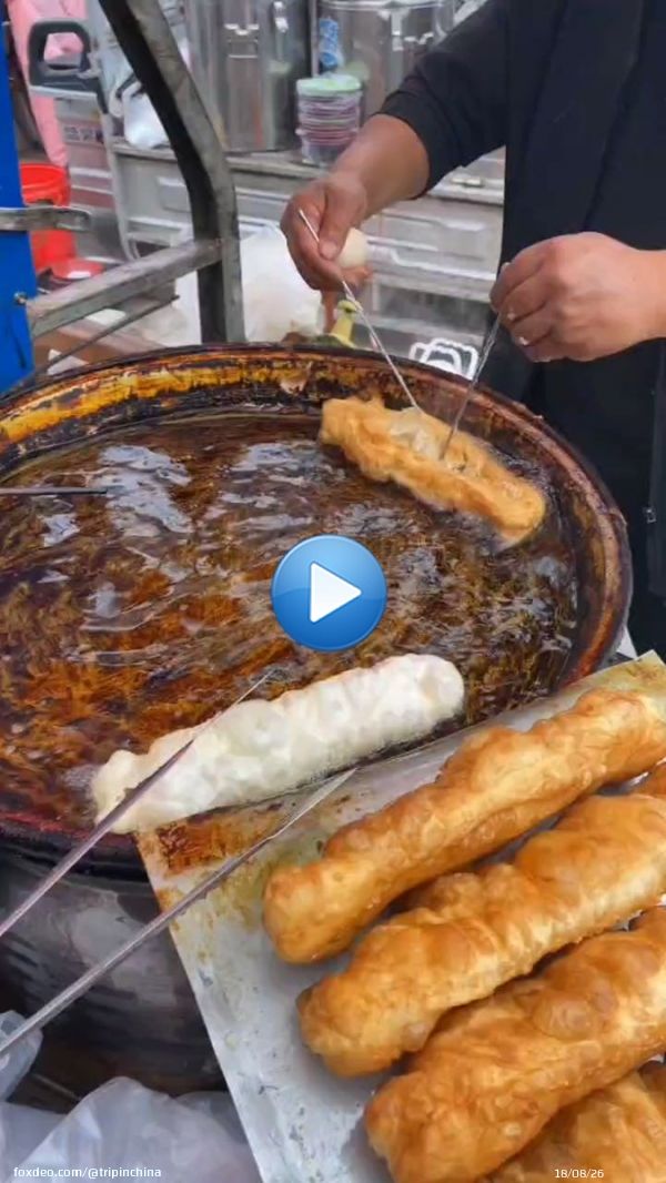 Delicious! Street breakfast for China people. fried dough sticks and eggs.