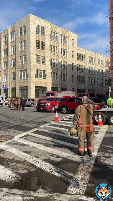 Buffalo Firefighters salute an ambulance as it leaves the scene of the Main Street fire #Buffalo #BuffaloFire