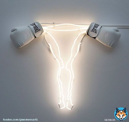 'Neon uterus with boxing gloves ovaries' by artist Zoe Buckman #WomensArt