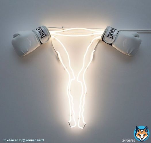 'Neon uterus with boxing gloves ovaries' by artist Zoe Buckman #WomensArt