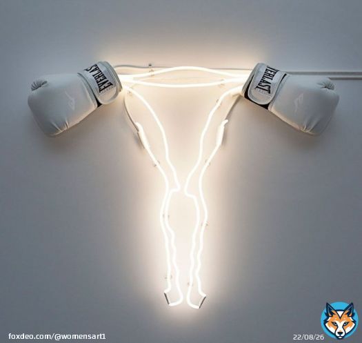 'Neon uterus with boxing gloves ovaries' by artist Zoe Buckman #WomensArt