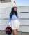 Photo shared by Derouich Fadwa on February 03, 2024 tagging @fashionnova. May be an image of 1 person, boots, top and skirt.