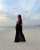 Photo by B R I \ud83e\udd8b on November 18, 2023. May be an image of fishnet stockings, gown and sarong.