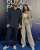 Photo shared by Jessie on February 08, 2024 tagging @greg_agopian. May be an image of 2 people, sweatpants, carpet, sweatsuit and text.