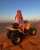 Photo by @karimasadani on December 18, 2023. May be an image of 1 person, camel, all-terain vehicle, face mask, headscarf, dune buggy, glasses and outdoors.