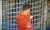 Courtois kissing the Real Madrid badge in front of Chelsea supporters.