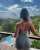 Photo by Nirelys Mateo in Puerto Rico. May be an image of 1 person, dress, sundress and horizon.