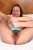 Bored housewife Alexis May attractively spreads her sweet hairy pussy on a bed