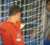 Thibaut Courtois kisses the Real Madrid badge in front of the Chelsea fans.