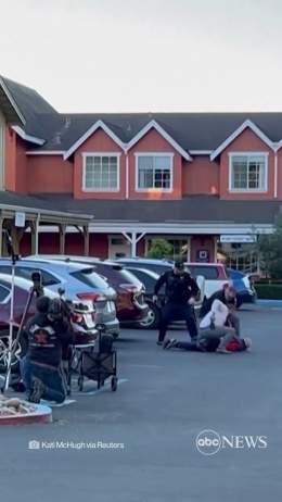 Eyewitness video shows police detaining the man suspected in a mass shooting in which seven people were killed in northern California&rsquo;s Half Moon Bay.