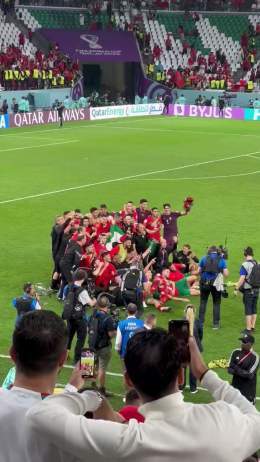 The Moroccan team celebrate with the Palestinian flag after reaching the quarter-final of the World Cup 0:0366.4K views