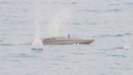 Так с близкого расстояния выглядели украинские беспилотные катера-камикадзе, безуспешно атаковавшие ночью разведывательный корабль &laquo;Приазовье&raquo; ЧФ РФ  Один из них имел собственное имя "Кот и енот"[Кiт та Єнот]