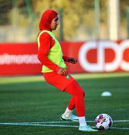 Photo by Nouhaila Benzina in Centre Sportif National De Football with @benzinanouhaila. May be an image of 1 person, playing football, playing soccer, cleats, ball and stadium.