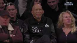 Kareem watching Bron close in on his record