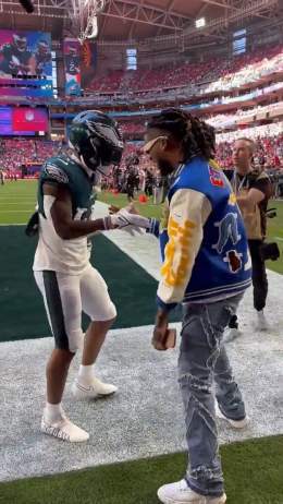 Damar Hamlin dapping up his childhood friend Miles Sanders   (via @NFL)