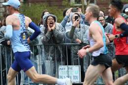 As thousands of runners embarked on a 26.2 mile trek from Hopkinton to Boston Monday, the weather was misty, chilly, and a little wet. But that didn&rsquo;t stop those in attendance from showing their support.