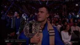MJF at UFC 282 rocking the AEW World title and flipping the bird.  Never change, Max.