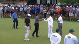 Scottie Scheffler, Ted Scott, and Phil Mickelson greet each other on the practice green.  #TheMasters