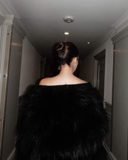 Photo shared by maria guardiola on January 19, 2024 tagging @barbarabuiofficial. May be an image of 1 person, makeup, fur coat, gown and dress.