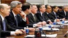 On the left, same guys, but with nice suits.   Will  ever incarcerate its financial terrorists?