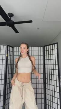 \ud83d\udc98 GIRL CRUSH \ud83d\udc98 @jessiereneewynter in our Stone Parachute Shell Cargos & Stone Basic Cotton Racer Crop Top \ud83d\udd25 Tap to shop \ud83d\udd0e