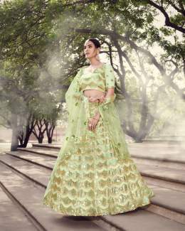 Net Bridal Lehenga in Green with Sequence work  Price: US$ 123.75  Product Code: 1696398 . . . . #indianweddingsaree #ethnicwear #traditionaldress #bollywood #womenfashion #indiandress #style #fashion  #weddingdress #bridal #heavydress #festivewears 