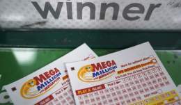 One of the two major U.S. lotteries is venturing into all-time records territory as Tuesday night's Mega Millions drawing was worth $785 million.