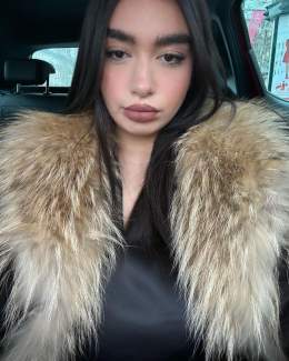 Photo by Yezzaswag on January 11, 2024. May be a selfie of 1 person, lipstick, eyeliner, makeup, hair, goosedown coat, sable coat, turtleneck and parka.